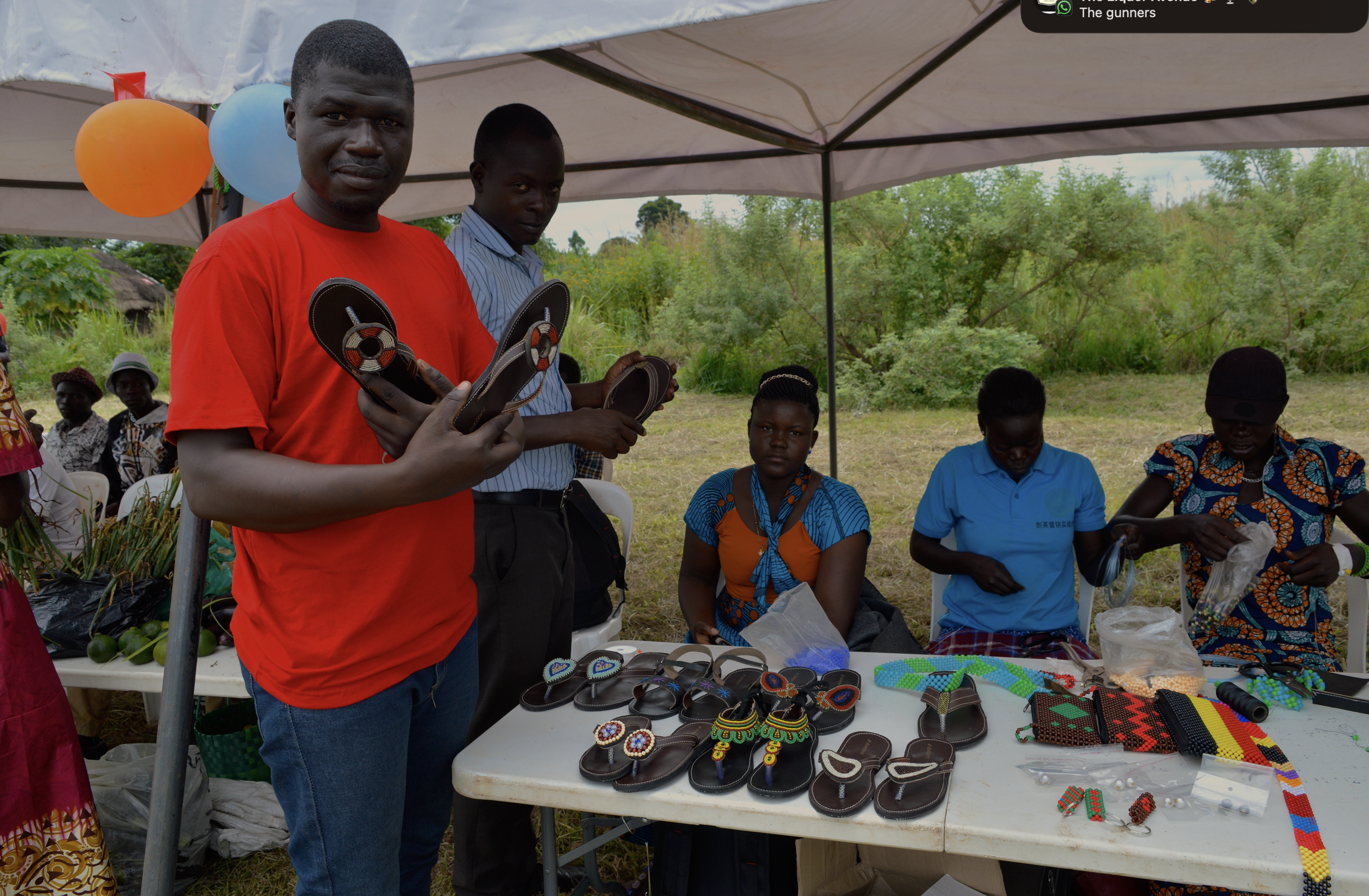 Youth crafting handmade goods for sale